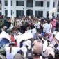 Dewan Pengurus Cabang (DPC) Serikat Petani Indonesia (SPI) Kabupaten Asahan menggelar aksi unjuk rasa di halaman Kantor Bupati Asahan, Kamis (24/9/2026), bertepatan dengan peringatan Hari Tani Nasional.