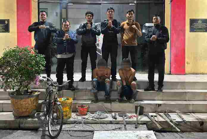 Tim Macan Polres Pelabuhan Belawan mengamankan dua pria yang diduga mencuri kabel fiber optik di Jalan Pancing I, Medan Labuhan.