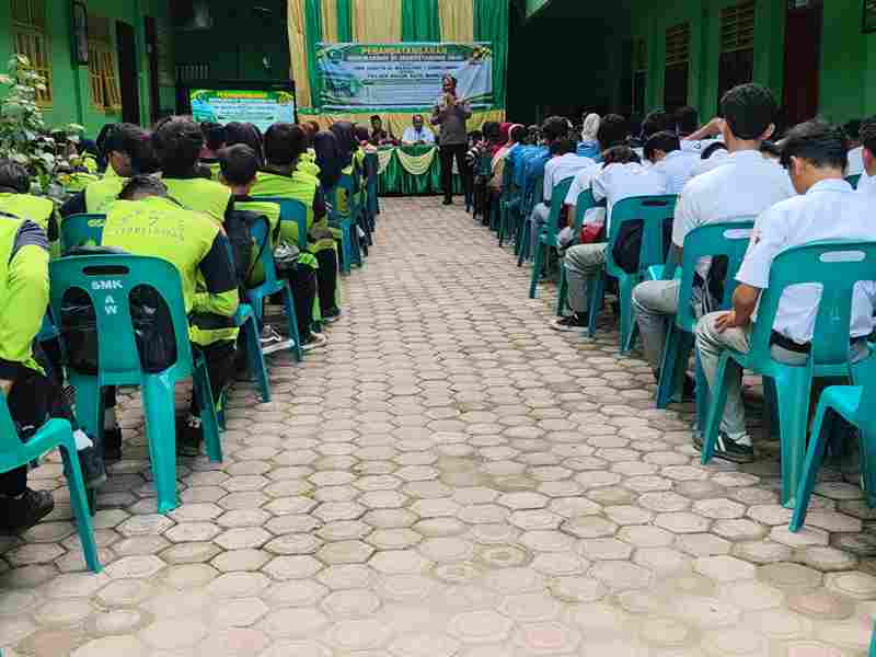 Polsek Dolok Batu Nanggar dan SMK Al Washliyah 7 Serbalawan menandatangani MoU untuk mencegah bullying, balap liar, narkoba, dan kenakalan remaja.