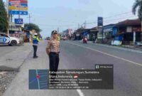 Kapolres Simalungun memimpin Strong Point Pagi di Sinaksak untuk membantu kelancaran lalu lintas