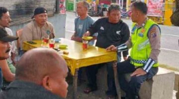 atuan Lalu Lintas (Satlantas) Polres Simalungun, Polda Sumatera Utara, merangkul pengemudi ojek pangkalan melalui kegiatan Ngopi Bareng Polantas di Simpang Pematang Panei, Jalan Pematangsiantar–Raya, Kecamatan Panombean Panei, Kabupaten Simalungun, Minggu (25/10/2026).